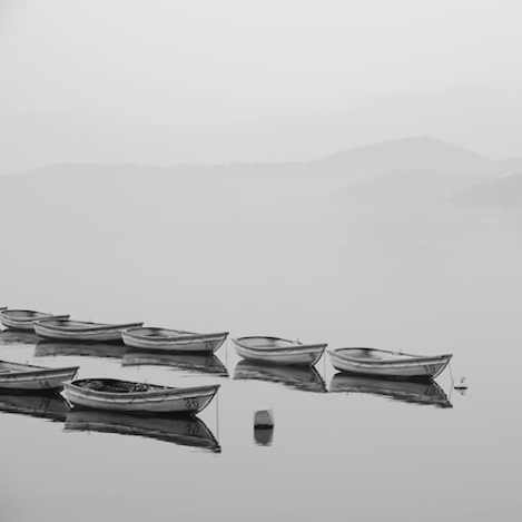 small boats on a lake
